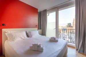 Letto o letti in una camera di Padova Suites C20