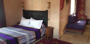 Postel nebo postele na pokoji v ubytování La Kasbah d'Ouzoud