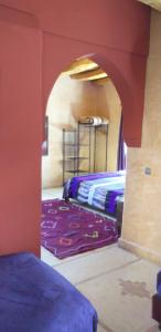 Postel nebo postele na pokoji v ubytování La Kasbah d'Ouzoud