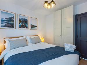 Postel nebo postele na pokoji v ubytování Macs Townhouse Dungarvan