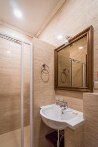 a bathroom with a sink and a mirror at Villa Bugaz in Zatoka +51 photos