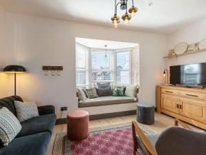 TV a/nebo společenská místnost v ubytování Macs Townhouse Dungarvan
