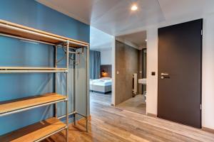 Postel nebo postele na pokoji v ubytování MEININGER Hotel Berlin Tiergarten