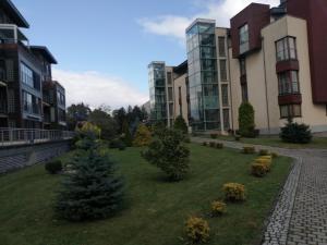 Vonkajšia záhrada v ubytovaní Apartament Słoneczny