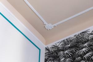 Postel nebo postele na pokoji v ubytování Hotel Coppede'