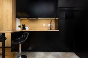 Kuchyňa alebo kuchynka v ubytovaní Apartments Warsaw Pawia by Noclegi Renters