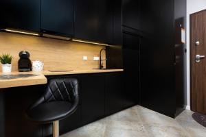 Kuchyňa alebo kuchynka v ubytovaní Apartments Warsaw Pawia by Noclegi Renters