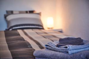 Postel nebo postele na pokoji v ubytování Chez Marie-Claude
