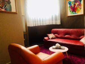 Posezení v ubytování Hotel Le Griffon