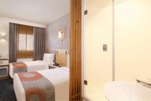 Posteľ alebo postele v izbe v ubytovaní Holiday Inn Express Pune Pimpri by IHG