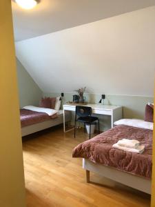 Ένα ή περισσότερα κρεβάτια σε δωμάτιο στο Villa Sole, Trysil