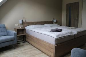 Voodi või voodid majutusasutuse Apartmány LAMA toas