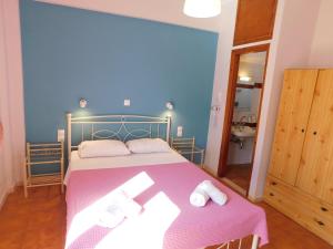 Postel nebo postele na pokoji v ubytování Perdika Mare Guesthouse