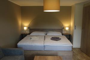 Voodi või voodid majutusasutuse Apartmány LAMA toas