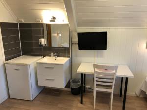 Kuchyň nebo kuchyňský kout v ubytování Ami Hotel + 37 fotografií