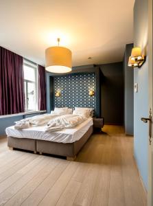 Postel nebo postele na pokoji v ubytování B&B Blomdaele