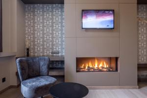 TV a/nebo společenská místnost v ubytování B&B Blomdaele