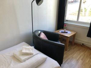 Postel nebo postele na pokoji v ubytování Ami Hotel