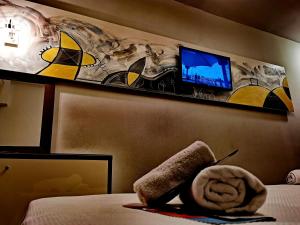 Posteľ alebo postele v izbe v ubytovaní Trokadero Boutique Hotel