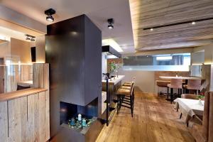 Ein Restaurant oder anderes Speiselokal in der Unterkunft Hotel Bergkranz 