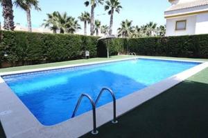 basen przed domem w obiekcie Fantastic Location - Penthouse Duplex in Cabo Roig in walking distance to the beach w mieście Cabo Roig