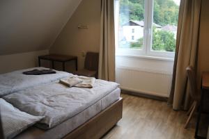 Voodi või voodid majutusasutuse Apartmány LAMA toas
