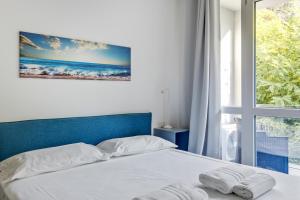 Posteľ alebo postele v izbe v ubytovaní Loft Moderno sui Navigli