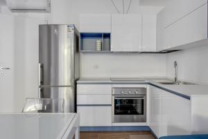 Kuchyňa alebo kuchynka v ubytovaní Loft Moderno sui Navigli