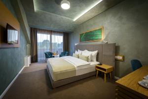 Een bed of bedden in een kamer bij Hotel Sunce