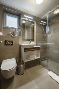 Een badkamer bij Hotel Sunce