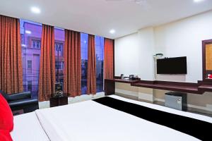 Un pat sau paturi într-o cameră la Hotel Best Inn