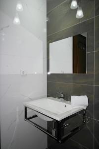 Ванна кімната в Pensao Central