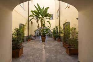 Vonkajšia záhrada v ubytovaní Magione Apartment with Terrace by Wonderful Italy
