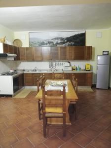 A kitchen or kitchenette at Le Coste Affittacamere