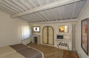 TV a/nebo společenská místnost v ubytování Villa Agnolaccio Residenza d'Epoca