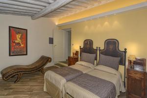 Postel nebo postele na pokoji v ubytování Villa Agnolaccio Residenza d'Epoca