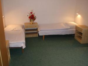 Posteľ alebo postele v izbe v ubytovaní Rekreacny dom Altwaldorf Vysoke Tatry