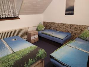 Postel nebo postele na pokoji v ubytování Apartmany Železná Ruda