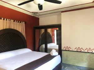 Ένα ή περισσότερα κρεβάτια σε δωμάτιο στο Hotel Tuul
