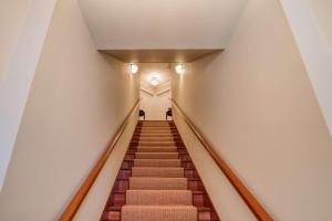 a flight of stairs in a building at 110 St. George Street in St. Augustine