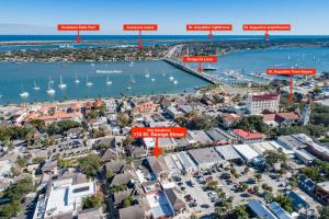 an aerial view of a city with a harbor at 110 St. George Street in St. Augustine