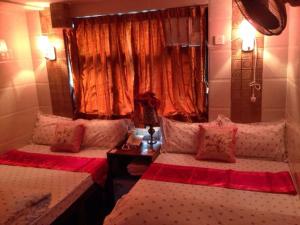 Ένα ή περισσότερα κρεβάτια σε δωμάτιο στο Marrigold Hostel