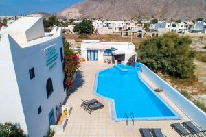 an aerial view of a villa with a swimming pool at Villa Limnes in Perissa