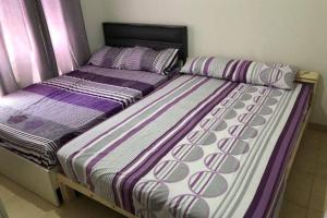 A bed or beds in a room at Amazing Chalet at Bluebay Asian Resort Pool View - Families Only Még 27 kép
