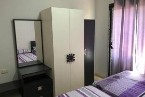 A bed or beds in a room at Amazing Chalet at Bluebay Asian Resort Pool View - Families Only
