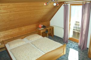 Posteľ alebo postele v izbe v ubytovaní Appartement Pension Grasser