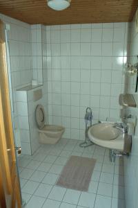 Kúpeľňa v ubytovaní Appartement Pension Grasser