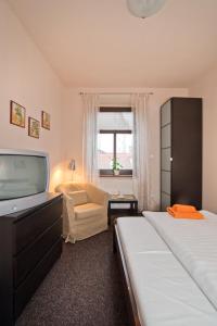 Letto o letti in una camera di Hotel U Zlatého býka