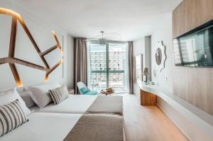 Posteľ alebo postele v izbe v ubytovaní The Ibiza Twiins - 4* Sup