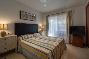 TV/trung tâm giải trí tại Casas-VeraPlaya Casa Marisol Al Andalus Thalassa